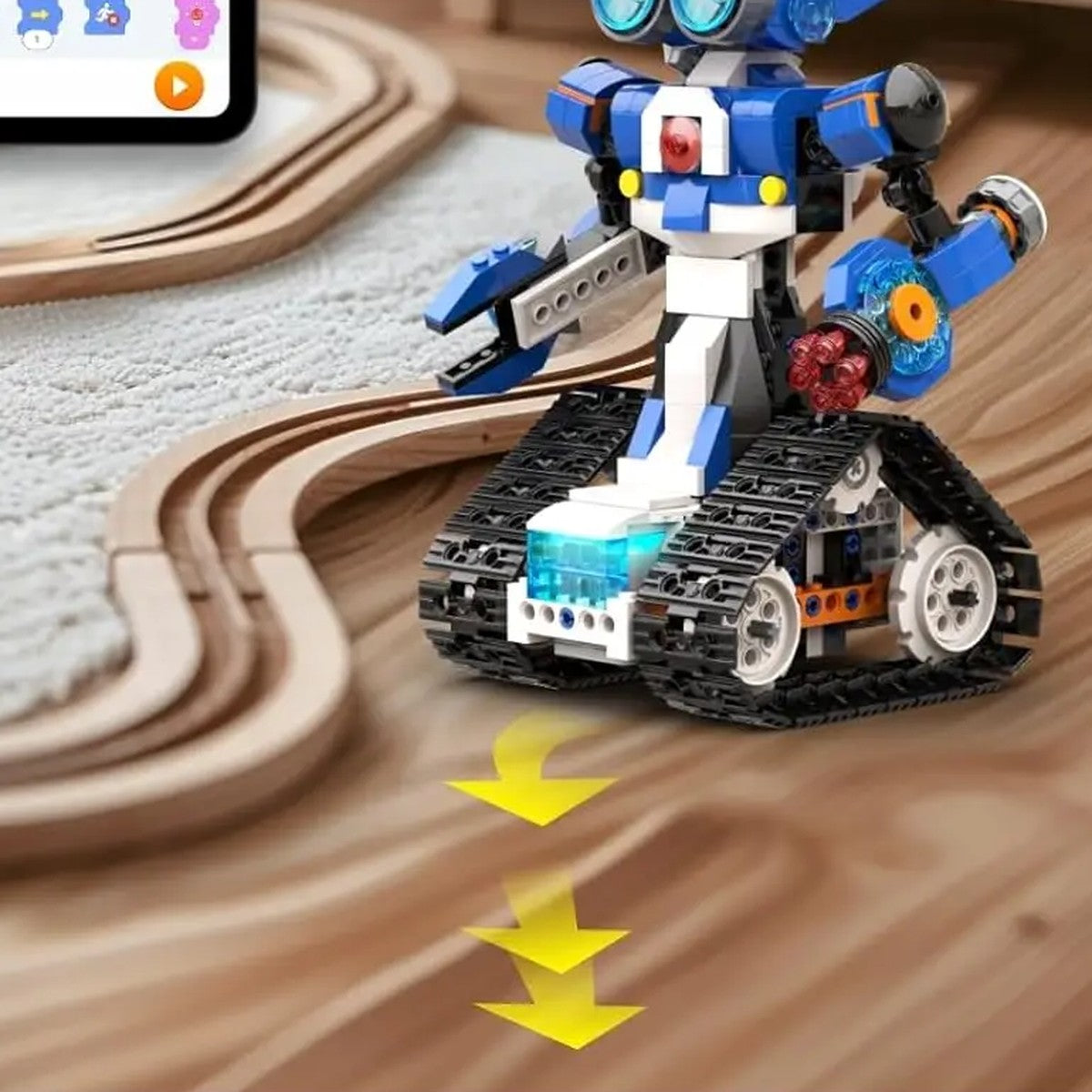 Robot J jedzie po drewnianym torze